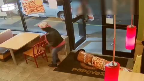 Watch ‘Extremely Drunk’ Woman Smash Popeyes Window Over Soda Spat