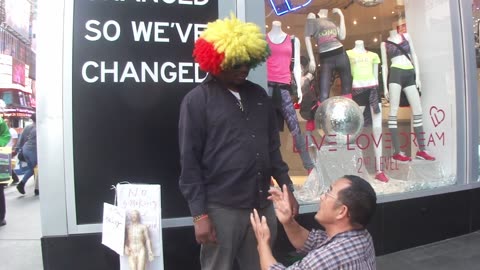 Luodong Massages African Man In Rainbow Wig