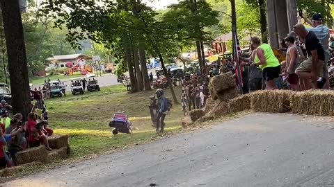 Toy Car Drivers Struggle to Steer Around Tight Corner