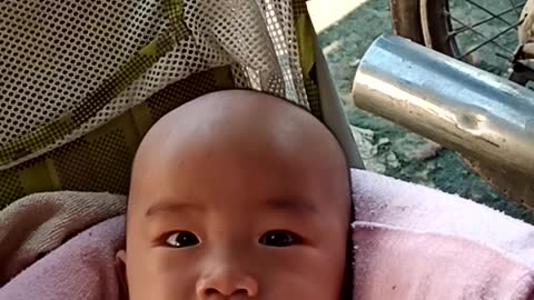 Cute baby with a guest smile.