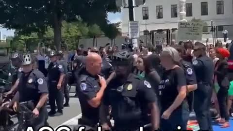 AOC Fakes Arrest (July 19)