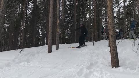 Collab copyright protection - teen skiis downhill flip snow fall