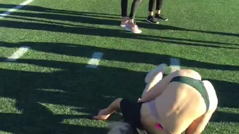 Football field girl fails backflip