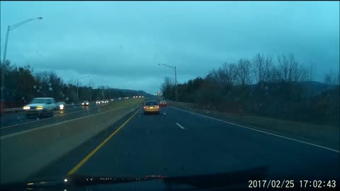 Car makes unsafe lane change on highway
