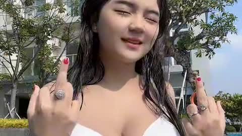 Sexy Asian girl swimming