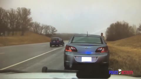 Dashcam Video Shows Cop Almost Hit By SUV In Minnesota