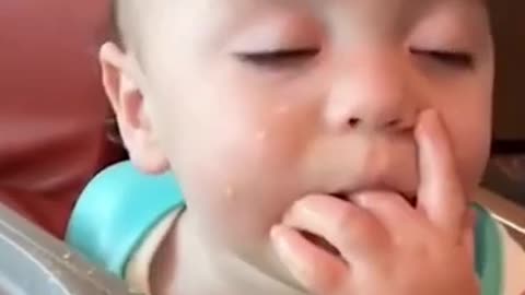 Funny baby eating