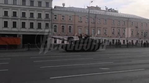 Ukraine War - A column of tanks and armored vehicles practicing for Victory day parade.