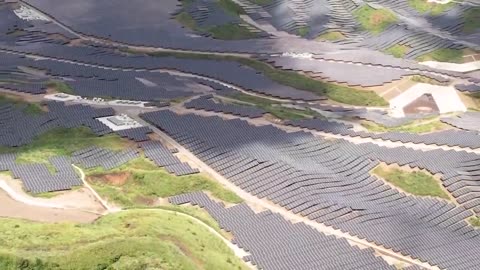 Destroying The Planet For a Climate Hoax! 200,000 solar panels on Mount Aso, Japan.
