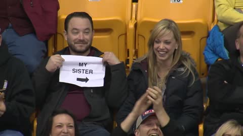 Guy Pulls Out Sign on Gophers Kiss Camera!!