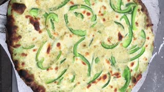 Green Pizza with pesto Alfredo sauce and Green Sweet peppers