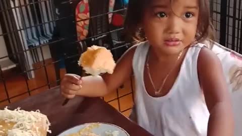 Baby Eating Yema Cake