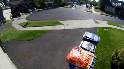 Kid Loses Cops in a Garbage Can