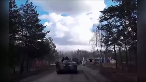 Russian tanks, troops and military vehicles move in on Kyiv region