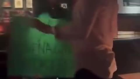 Unhinged anti-white racist screams at White people inside a Dallas, Texas restaurant