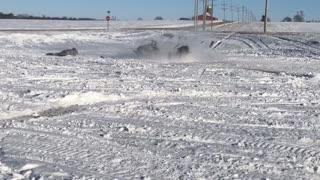 Snowmobile Dumps its Rider and Keeps Rolling