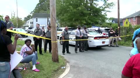 Black man shot dead by police serving warrant