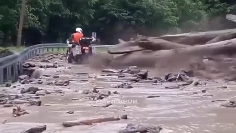 Unaware Biker vs Landslide