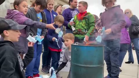 100's Participate in "BURN THE MASK" Event In Front Of IDAHO STATE CAPITOL