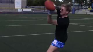 Trying to catch the fastest football ever thrown