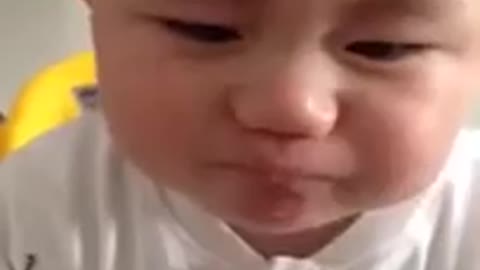 Baby eats lemon, funny reaction