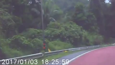 Truck Spins Down Road