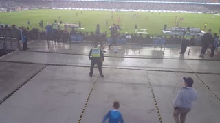 Police Officer Plays Soccer With Kids