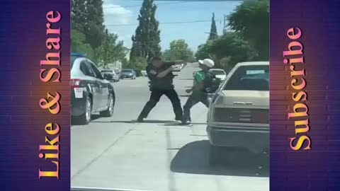 U.S Police Officer fighting With Civilian 🙄 They’re so real for keeping this fight fair -