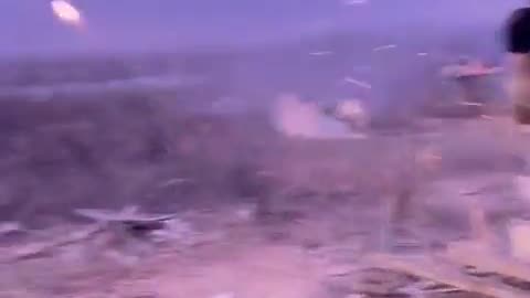 Ukrainian infantryman fires an FGM-148 Javelin to hit a distant target across a river