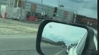 Fast Moving Freight Train Crashes Into And Destroys A SUV Stuck On The Tracks