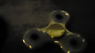 Gold fidget spinner super slow motion