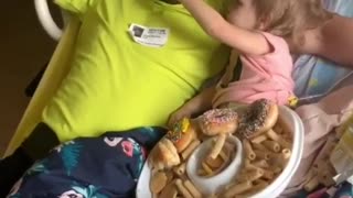Kiddo Keeps Feeding Her Father