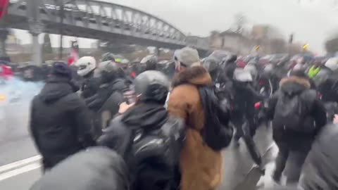 Tear gas for Anti vaccine passport riots in Paris