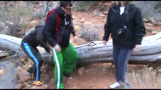 Kid Posing On Log Face Plants Into River
