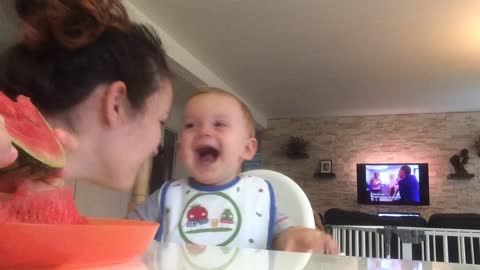Baby laughs to tears when mommy eats watermelon