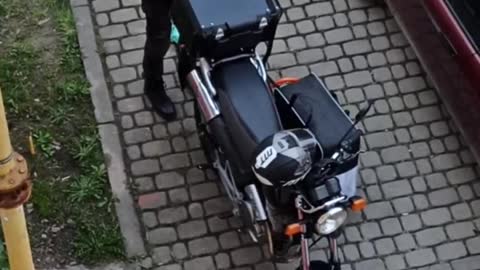 Loading motorcycle 1 day War in Ukraine 2022