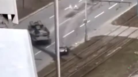 WATCH: Ukrainians Try To Pull Driver From Wreckage After Military Vehicle Runs Over Car