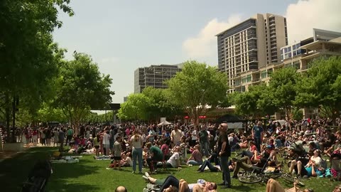 Solar Eclipse 2024: Crowd in Downtown Dallas reacts to darkness