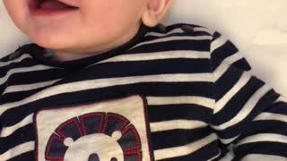 How cute baby boy giggles