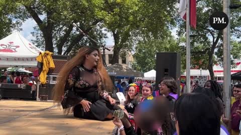 A drag queen dances to a Disney song at a "family-friendly" drag show in San Marcos, Texas