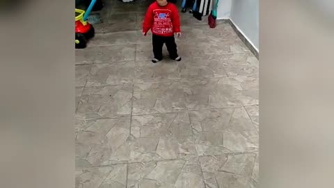 Little Bryan taking his first steps