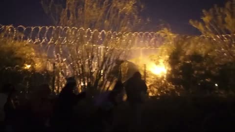 Migrants in Ciudad Juarez camp along Rio Grande awaiting chance to cross into the United States