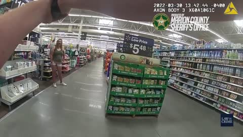 Body am Shows Police Tasing Armed Woman in Florida Walmart.