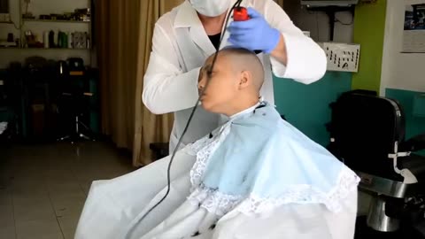 Girl head shaved