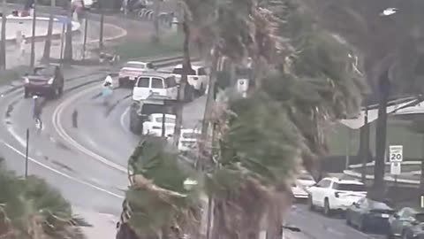 Footage captures waterspout ripping through crowded beach