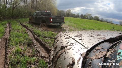 Chevy Blazer rescues F-250 from deep mud!