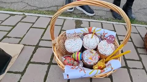 People in Donetsk consecrate Easter treats ahead of the upcoming Easter holiday
