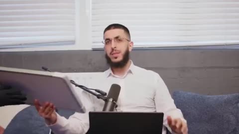 Ali Dawah communicates with his wife with a dry erase board he bought for her