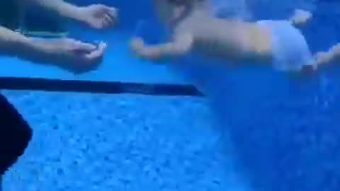 " A Little Baby's Training To Swim '