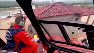 Aerial footage shows rooftop rescues amid Brazil floods